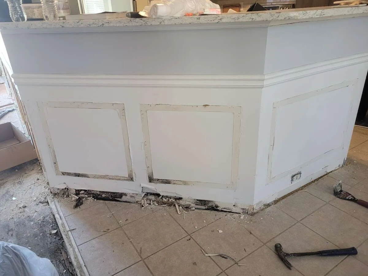 Water damage and mold on kitchen during Storm Damage Restoration in Ben Lomond